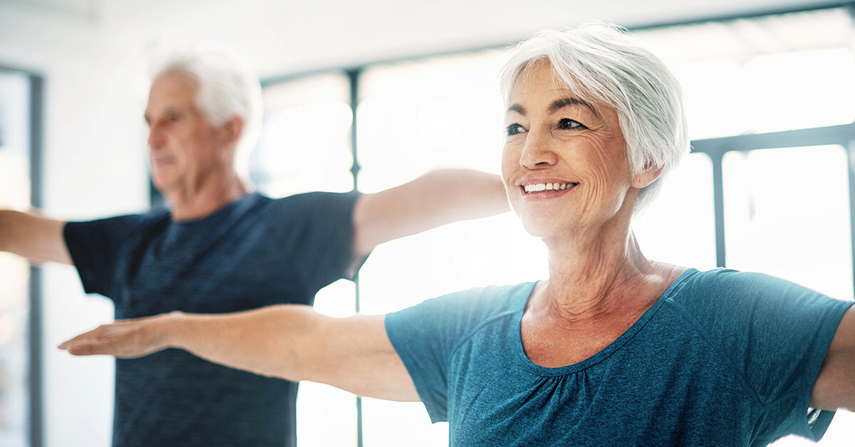 Close up of senior woman in yoga class