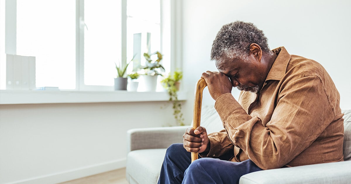 Senior man with cane