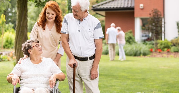 Senior couple with nurse