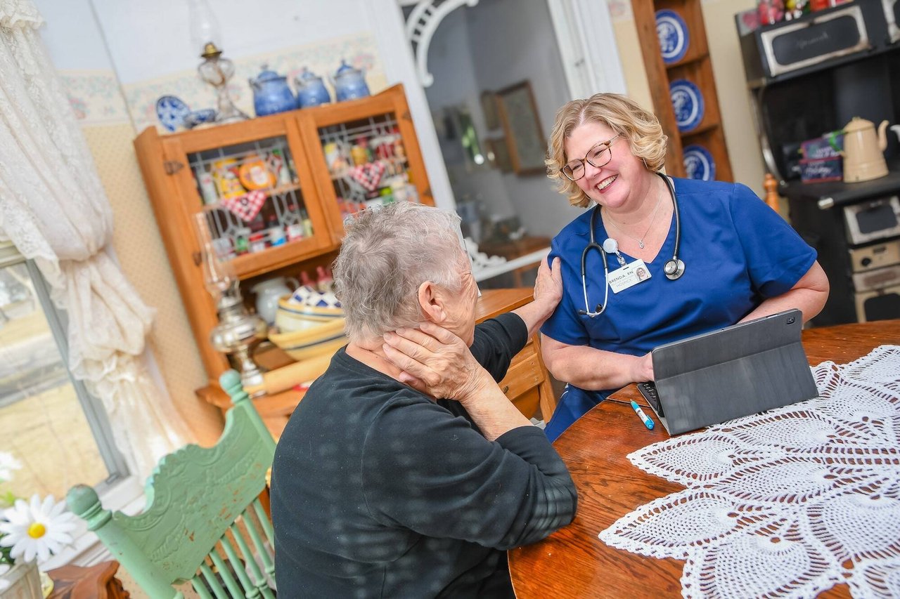 nurse and patient talking