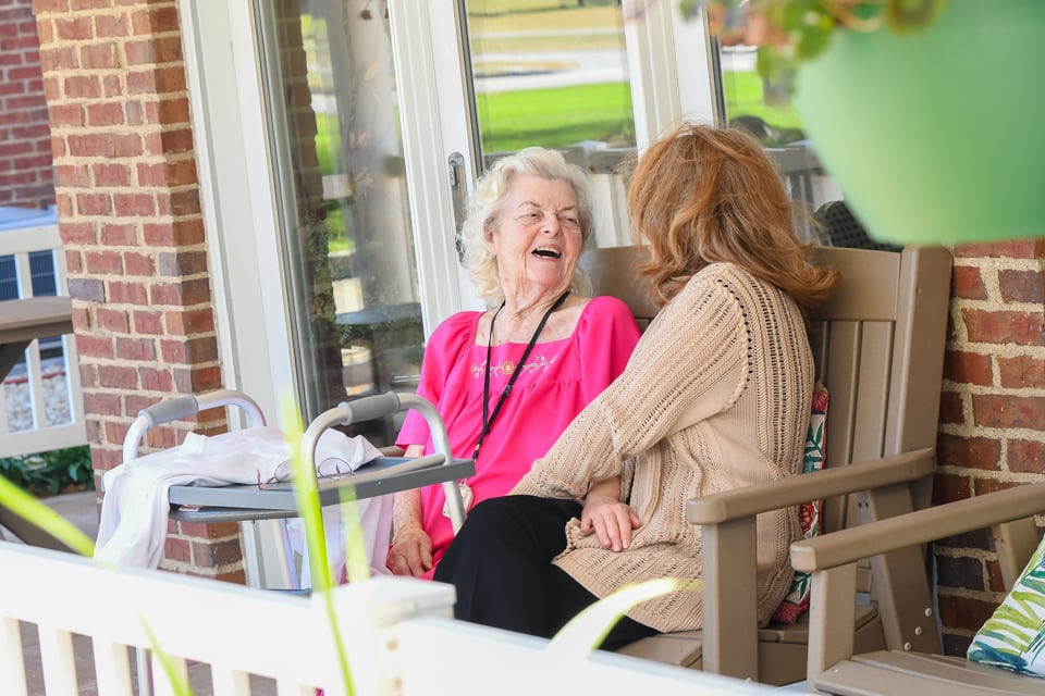 people talking on patio