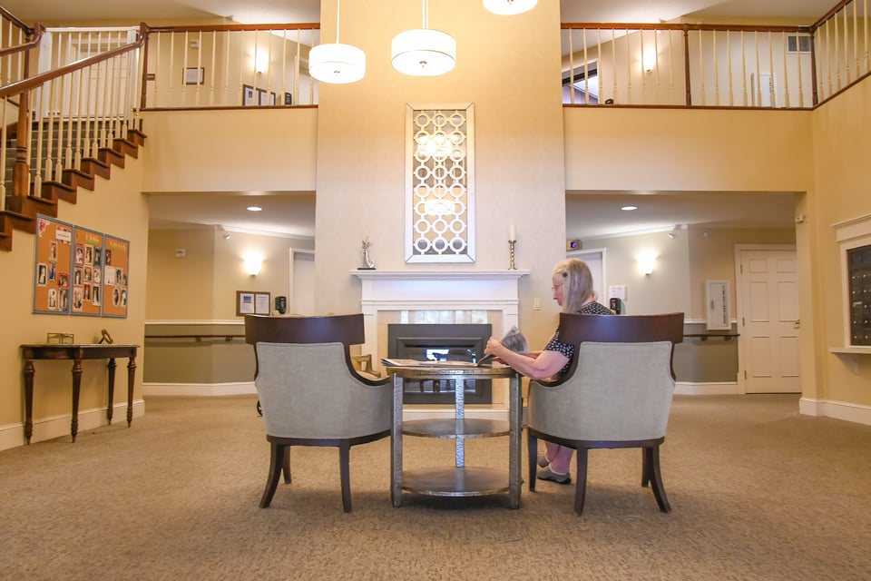 person sitting on chair in living area