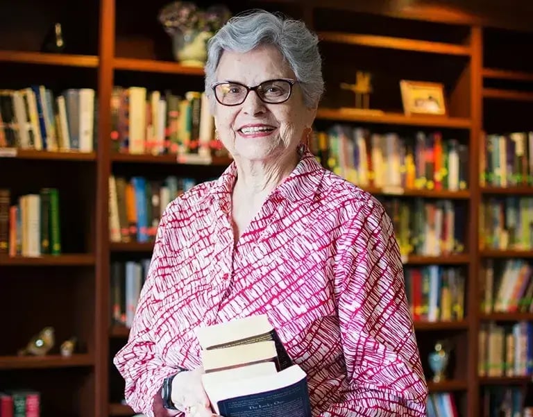 woman smiling in library