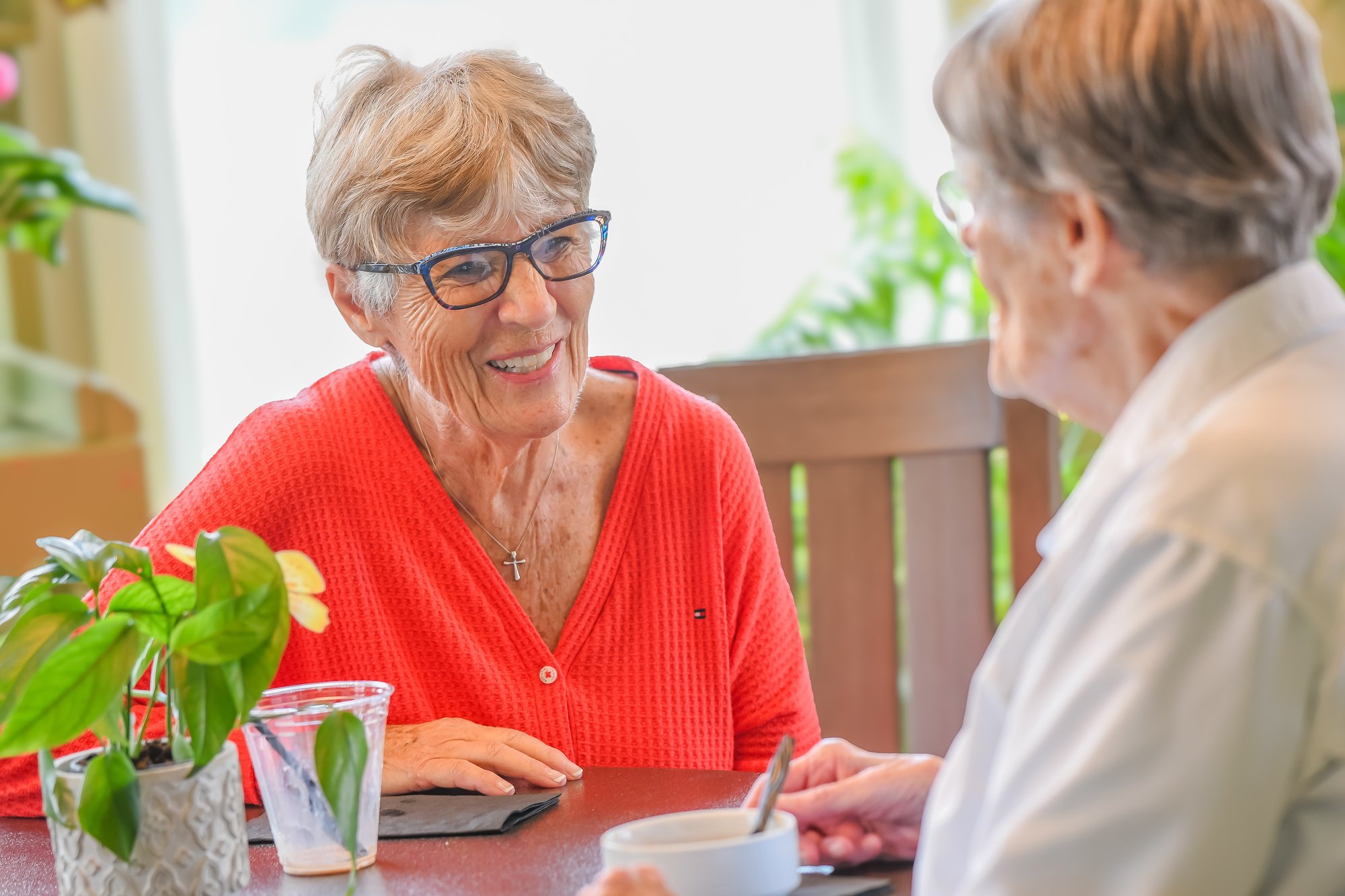 woman smiling with friend