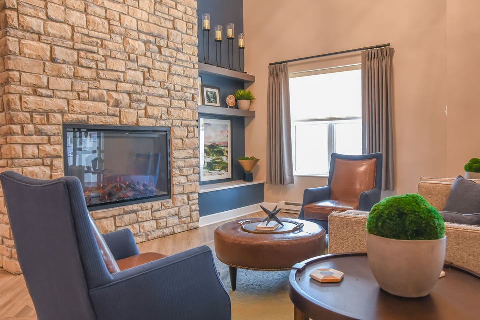 lobby with fireplace and window