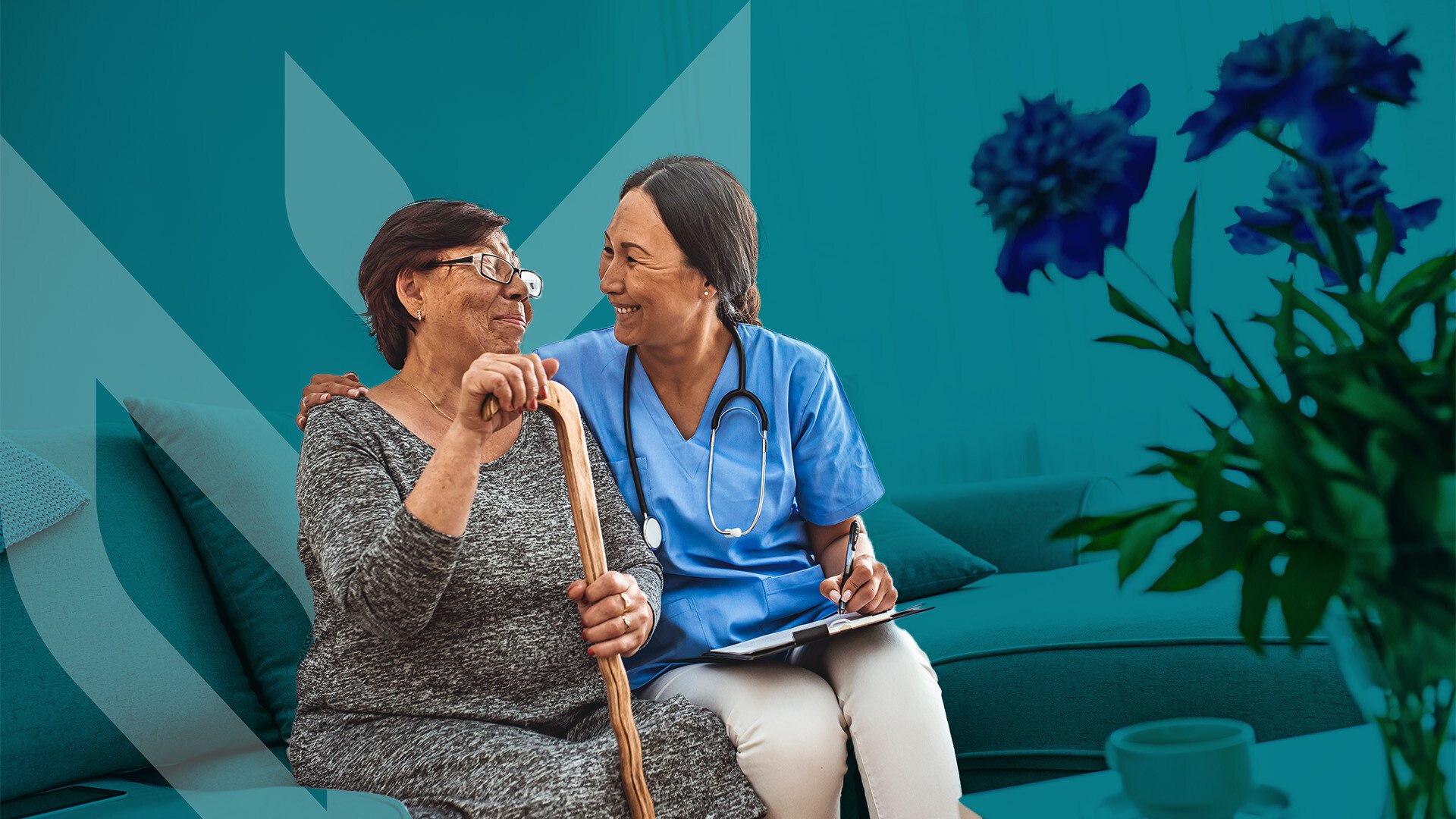 smiling nurse with arm around older woman