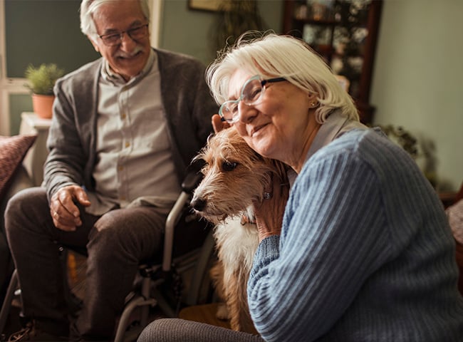 Photo of two older adults in an independent living community