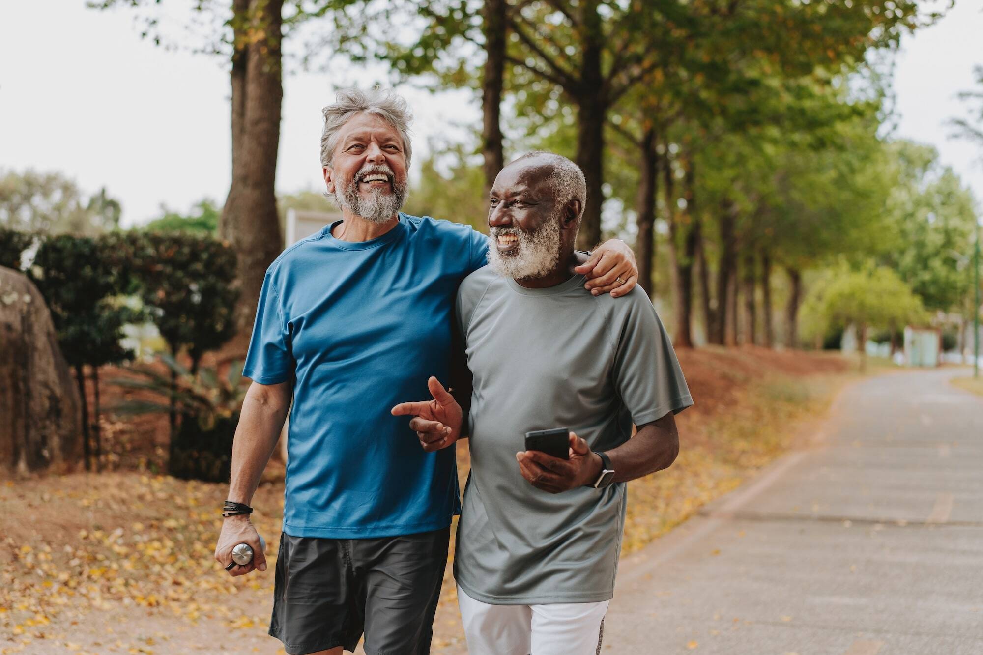 two men walking outside